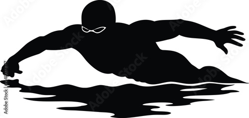 Silhouette of a muscular swimmer in action in the water
