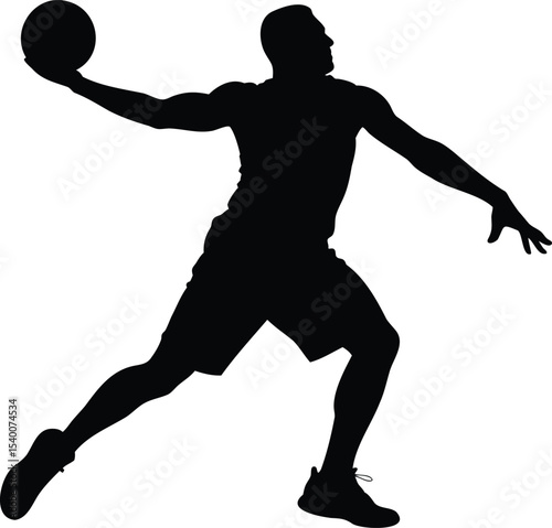 Silhouette of basketball player in motion ready to pass or shoot ball