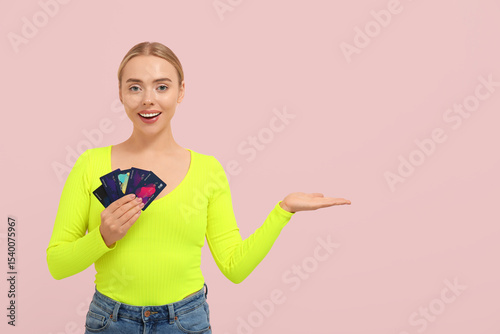 Pretty young woman with cre...