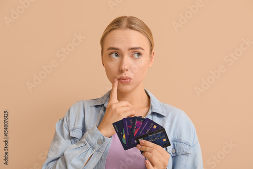 Pondering young woman with ...