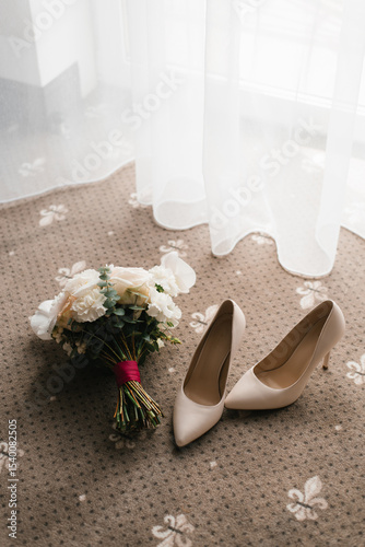 Wedding Bouquet and White Shoes with Light Curtain