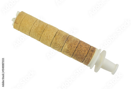 Old, dirty, and well-used water filter set against a transparent background