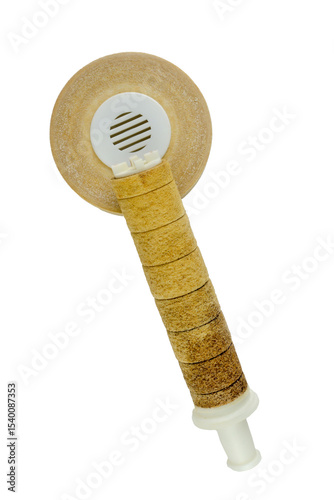 Old, dirty, and well-used water filter set against a transparent background