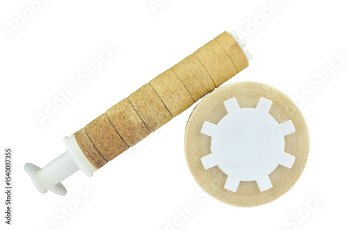 Old, dirty, and well-used water filter set against a transparent background