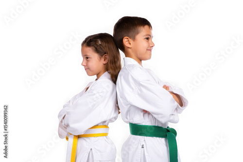Martial Arts Young Karate Kids, Back-to-Back, Displaying Discipline, Focus, and Teamwork in White Uniforms