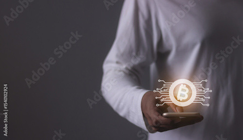 Young man using smartphone hand touching to trade cryptocurrencies online, Investors in cryptocurrencies and bitcoin coins online