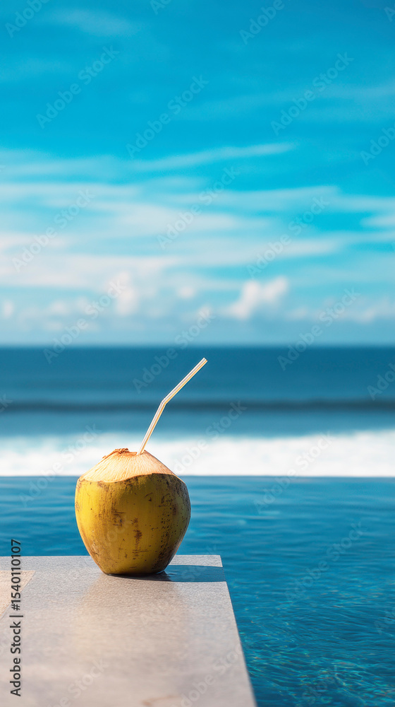 Tropical beach scene with fresh coconut drink overlooking ocean waves Tropical beach scene with fresh coconut drink overlooking ocean waves