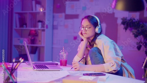 Creative Self-Discovery, Digital Expression, Gen Z Space. Teen Girl Works in Neon Room, Immersed in a Personal Project or Homework. Creativity Becomes a Way to Understand Herself and the World