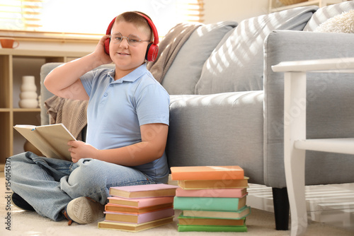 Little boy with headphones ...