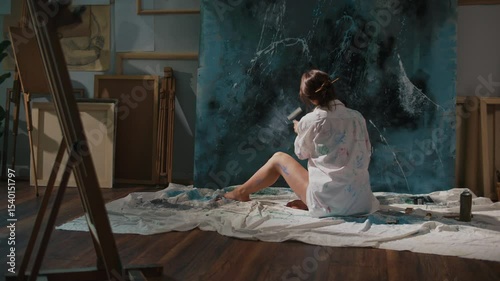 An Artist Paints a Large Abstract Artwork in His Studio, Using Art as a Tool for Personal Growth and Self-Development. Connection Between Creativity and Mental Well-Being Through Artistic Exploration