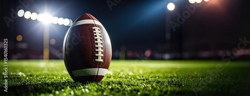 American football on field under bright stadium lights conveying the energy of game day and cultural significance in the United States