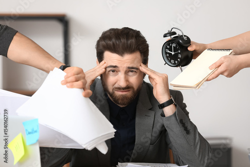 Stressed businessman with a...