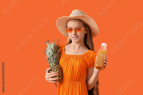 Teenage girl with juice and...