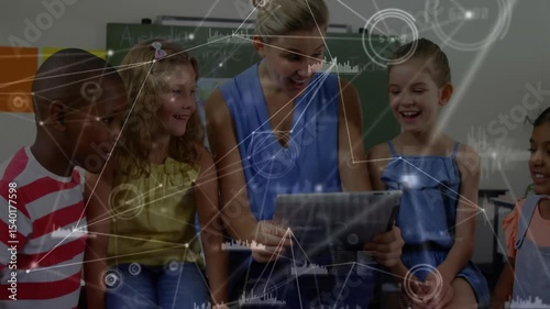 Wallpaper Mural Teacher powering on tablet launching educational app with children activating animated lesson Torontodigital.ca