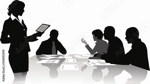 Silhouette image of a woman presenting with a tablet to a group of people at a conference table