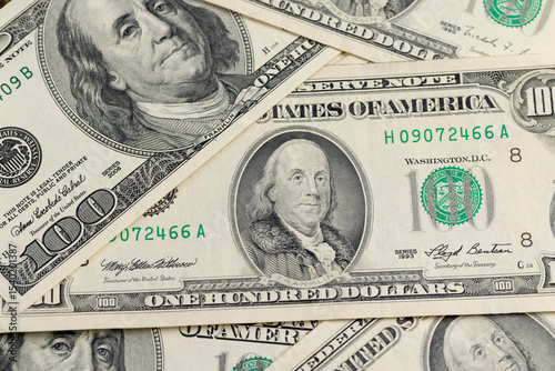 one hundred dollars , old American dollars in face value of 100, closeup