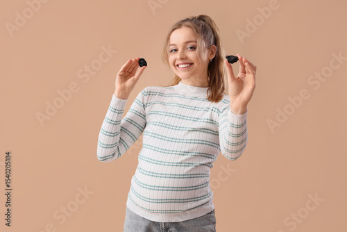 Young pregnant woman with d...