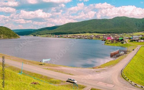 beautiful view of the Uzian reservoir and the Kraka ridge in the Southern Urals on a sunny summer day photo