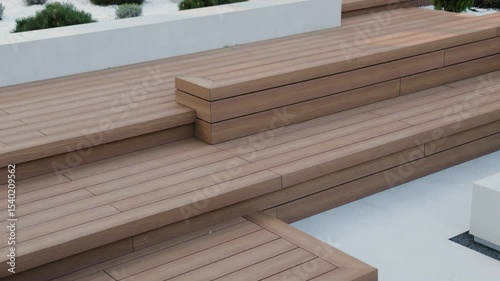 Recreation area near the house with a wooden terrace. Modern wooden stairs. Wooden stairs on the street. Wooden terrace with landscaped garden.