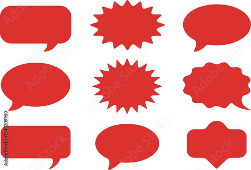 A collection of nine red speech bubbles of varying shapes arranged on a light background surface
