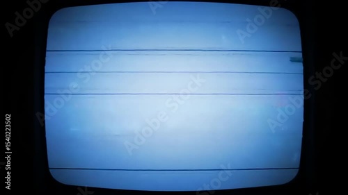 Vintage television screen displaying a blue static image with horizontal lines