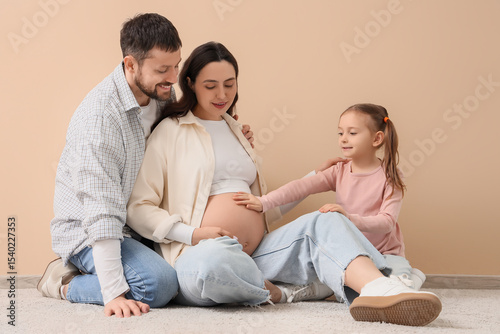 Cute little girl with her p...