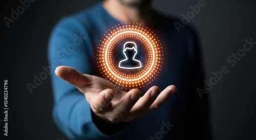 White person icon glows above open palm of hand with dark background