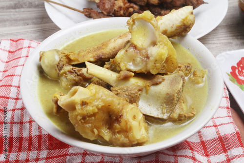 a bowl of curry, gulai