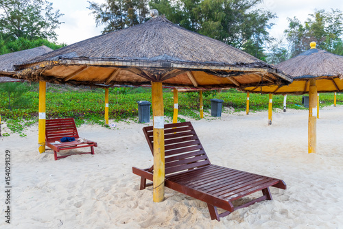 The sunshade umbrella on the beach by Yalong Bay in Sanya, Hainan, China photo