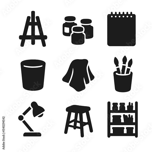 Art Workspace Icons. Solid, filled icons set of art studio workspace: table easel, paint jars, sketchpad,