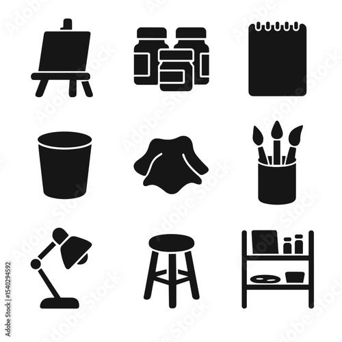 Art Workspace Icons. Solid, filled icons set of art studio workspace: table easel, paint jars, sketchpad,