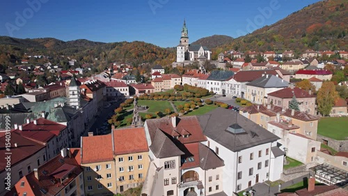Flight over of old town Kremnica at autumn, Central Slovakia.