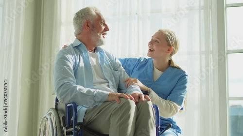 Help support retirement healthcare. Nurse helping old man in wheelchair. Patient and woman in nursing home for medical caregiver. Nurse taking care of paralyzed man in chair for people with disability