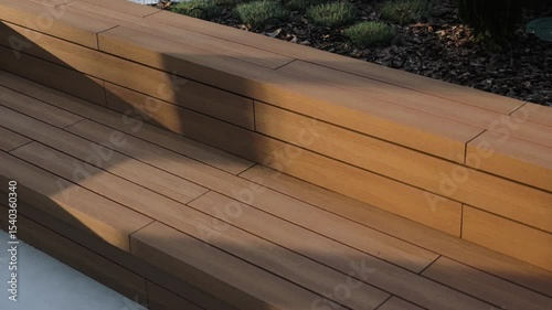Wooden terrace, outdoor seating area with convenient stairs. House with wooden terrace. Wooden stairs on the street.