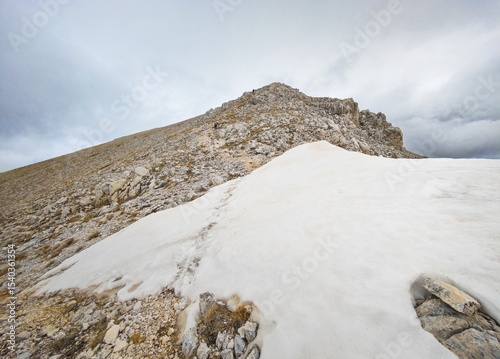 Monte Velino (Italy) - The landscape summit of Mount Velino, one of the highest peaks of Apennines, 2487 meters. In the Sirente-Velino park, Abruzzo, with Grotta di San Benedetto cave.