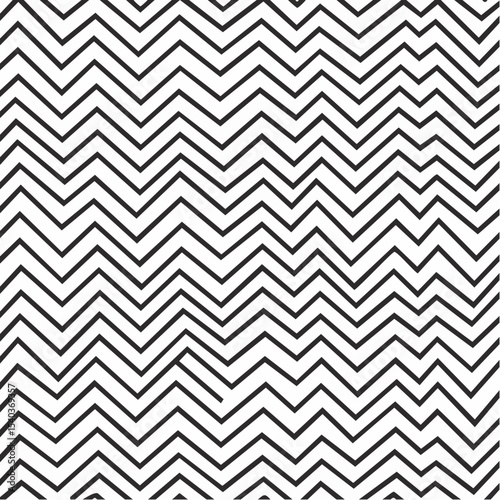 Abstract black and white chevron pattern design creating a visually dynamic and modern texture with a seamless zigzag repeating motif