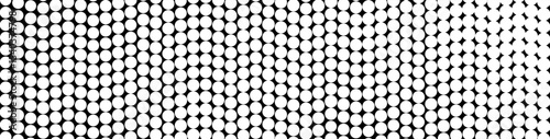 halftone dots. Black dots on white background. using smaller dots for lighter areas and larger ones for darker regions. This pattern will create a dynamic visual texture, perfect for backgrounds