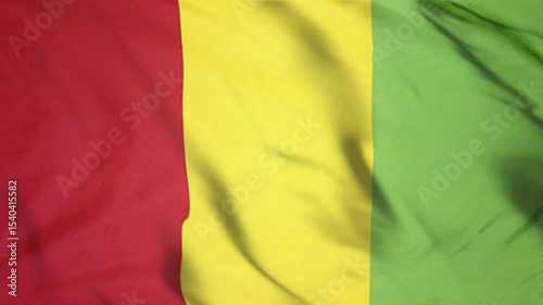 Flying Guinea Flag Video, Cinematic Shot of Guinea Flag Fluttering