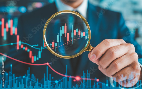 Business analyst examining financial charts through a magnifying glass for investment analysis and market trend investigation.