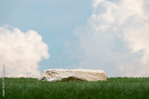 Surreal stone podium with green grass white clouds on blue sky nature forest background.Product present natural placement pedestal minimal display,paradise dreamy concept.