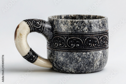 A photorealistic Inuit soapstone water cup with smooth gray stone