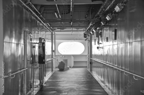 Outdoor promenade boat pool deck onboard modern luxury cruiseship cruise ship ocean liner with sun loungers and deck chairs for guests passengers with ocean views