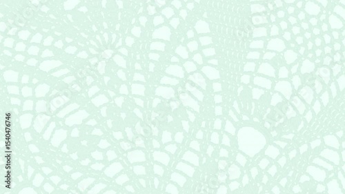 淡いグリーンの濃淡のあるレースの模様。ゆっくりと回るループ。