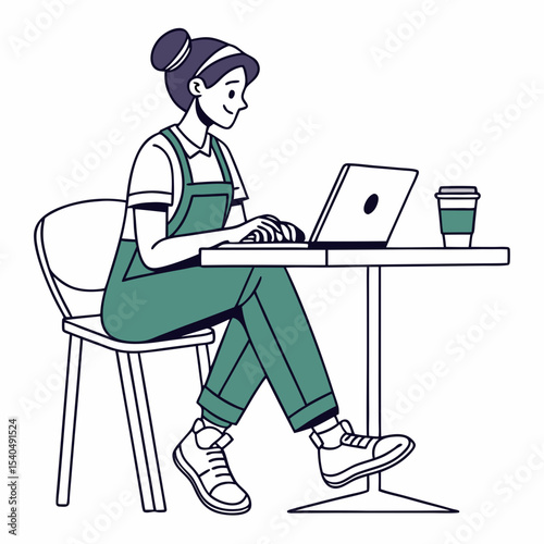 Young woman working on laptop at cafe table