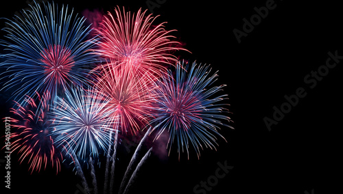 Vibrant Red, White, and Blue Fireworks Exploding on Black Night Sky, Perfect for Fourth of July and Patriotic Celebrations.