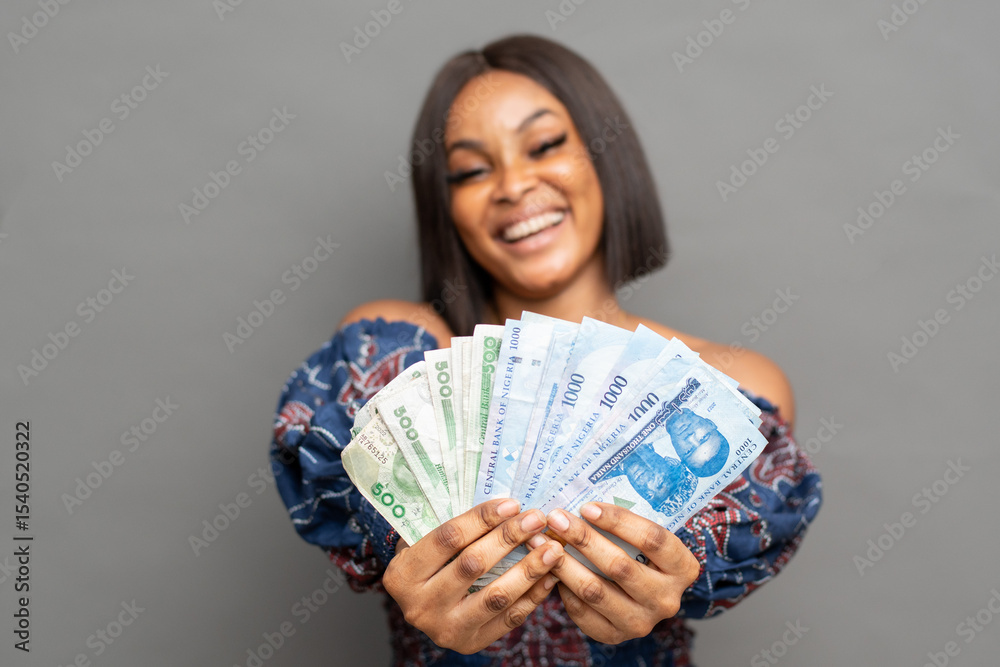 pretty african woman smiling and flaunting some cash pretty african woman smiling and flaunting some cash