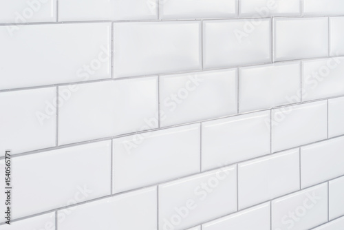 white subway tile wall background on vanishing angle