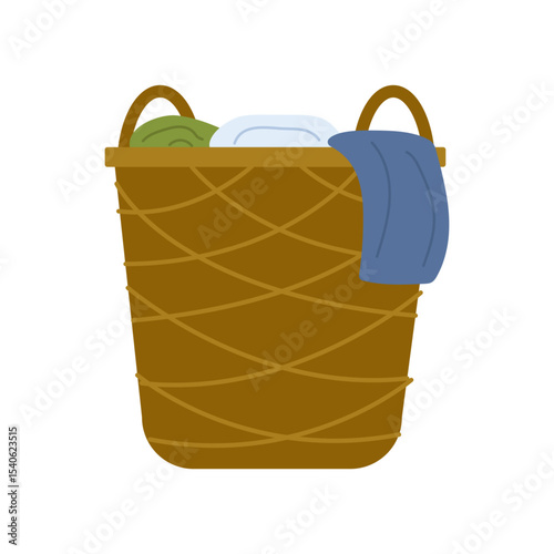 Laundry basket filled with clean clothes resting in a cozy laundry room