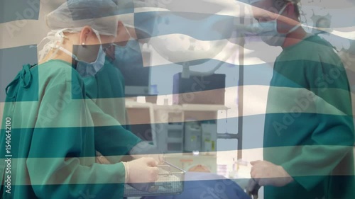 Surgical team organizing tools and trays after gathering around patient for surgery prep