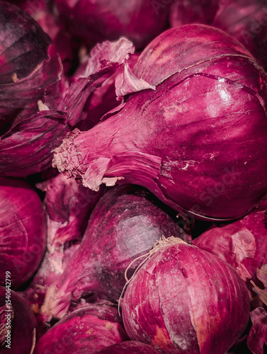 Close-up of many red onions